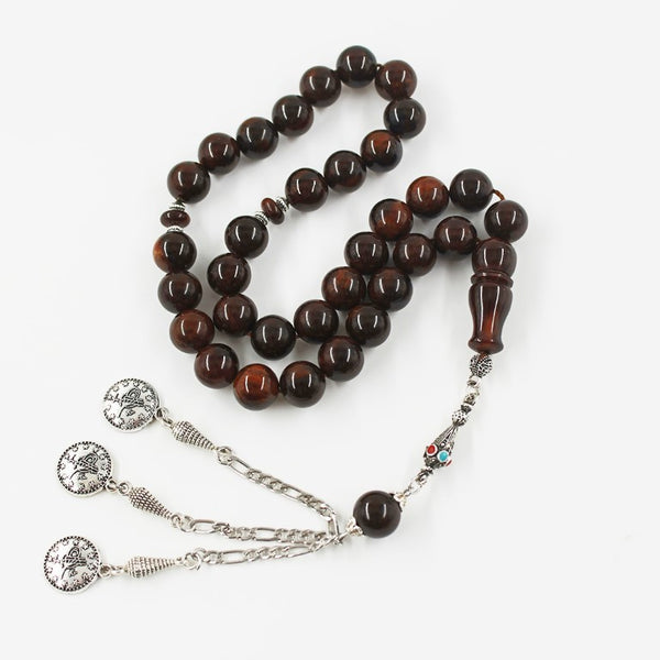 Antique musky sandalous rosary in luxurious black, medium bead woven with durable propylene thread and with a tassel made of a mixture of antimony and metal.