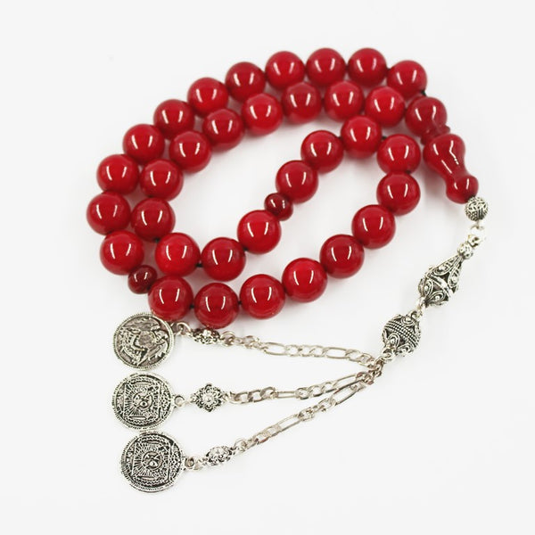 Antique Turkish faturan rosary in beautiful cherry red, medium bead, woven with durable propylene thread and with a tassel made of a mixture of antimony and metal.
