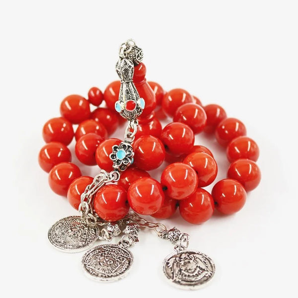 Antique Turkish faturan rosary in a wonderful honey color, medium bead, woven with strong propylene thread and with a tassel made of a mixture of antimony and metal.