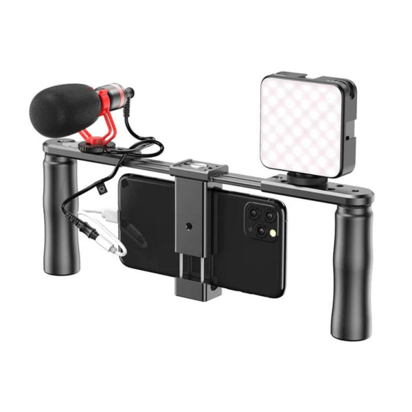 Metal phone mount with two handles with microphone and light holder of the smartphone equipment for professional photography of interviews, trips and adventure photos